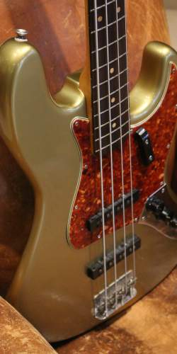 Fender Jazz Bass Serie L Gold Refin de 1964